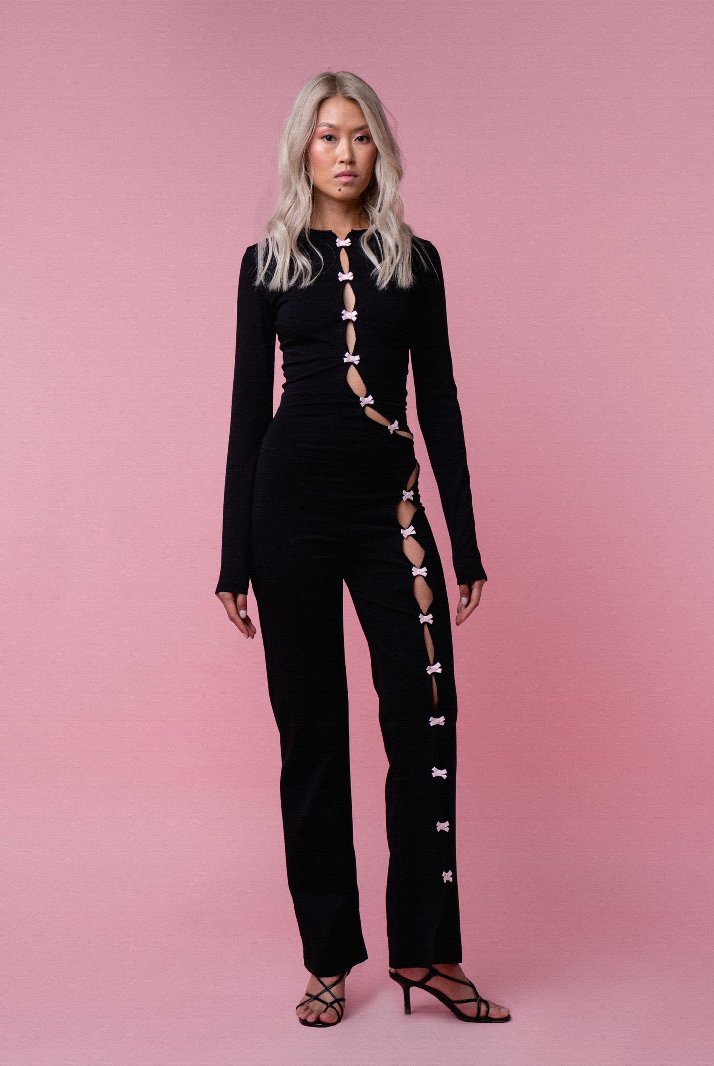 Комбінезон чорний з бантиками